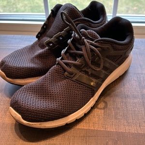 Men’s black Adidas sneakers